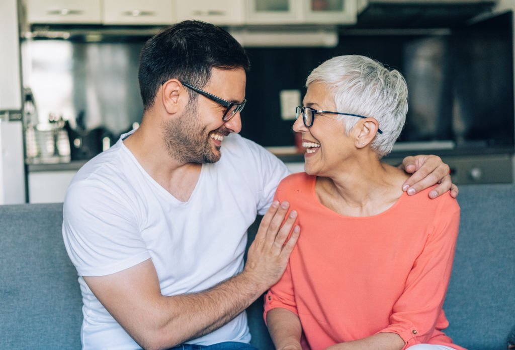 Happy senior woman and her son